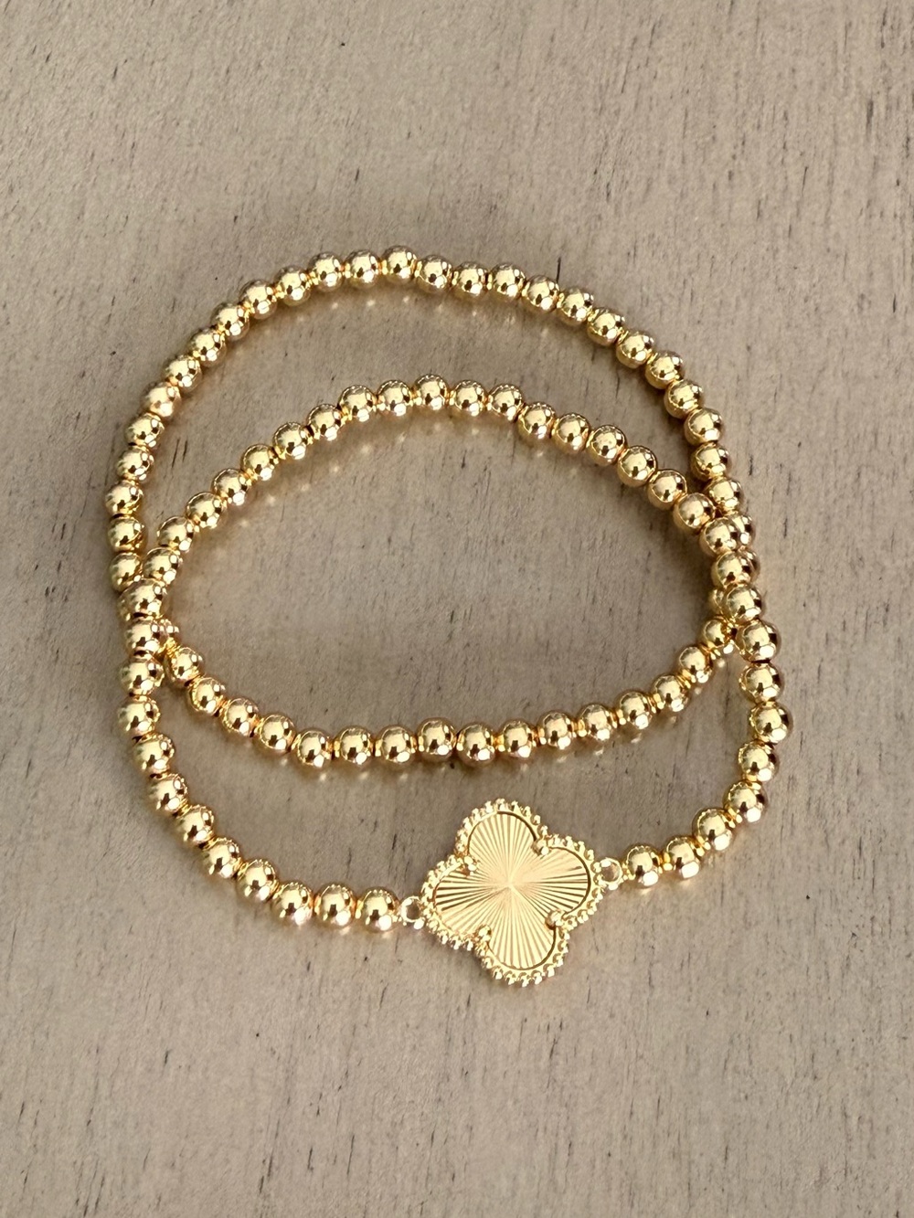 Gold Beaded Double-Strand Bracelet with Clover Medallion